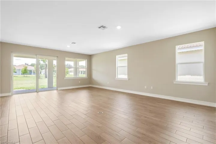 Empty room featuring light hardwood / wood-style flooring