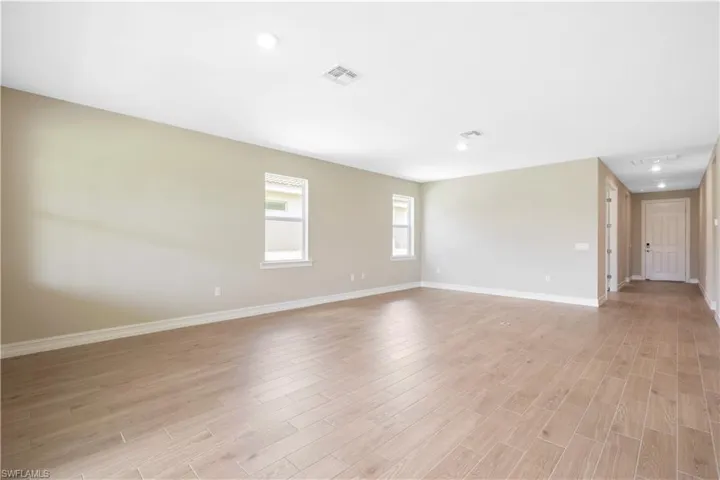 Empty room with light wood-type flooring