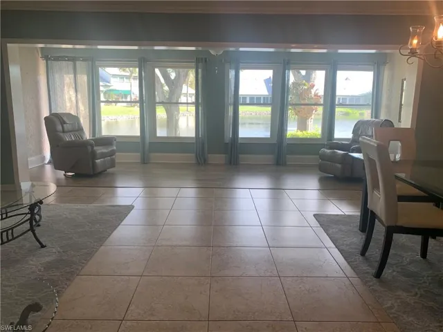 Living room featuring tile patterned flooring