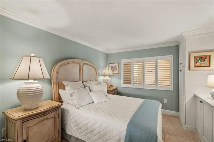 Bedroom featuring ornamental molding