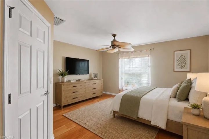 Virtually staged as a bedroom could be an office or den