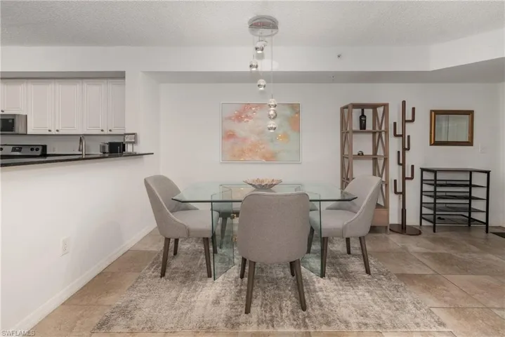 Dining room featuring a textured ceiling