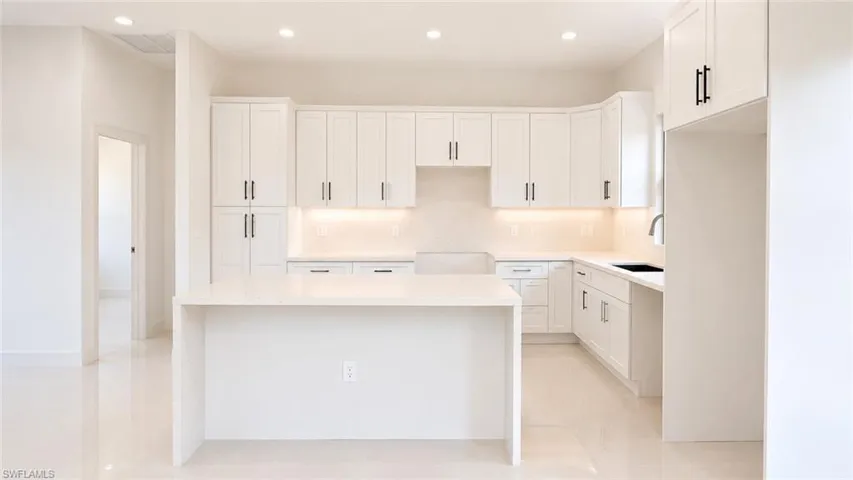 703  Long Island E ST, Lehigh Acres, FL 33974