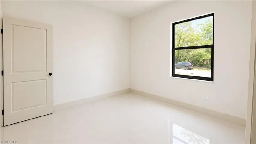 703  Long Island E ST, Lehigh Acres, FL 33974