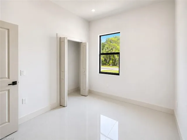 703  Long Island E ST, Lehigh Acres, FL 33974