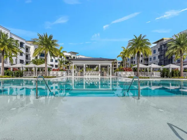 Community pool featuring a patio area