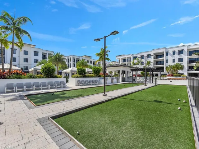 View of home's community featuring a bocce ball area