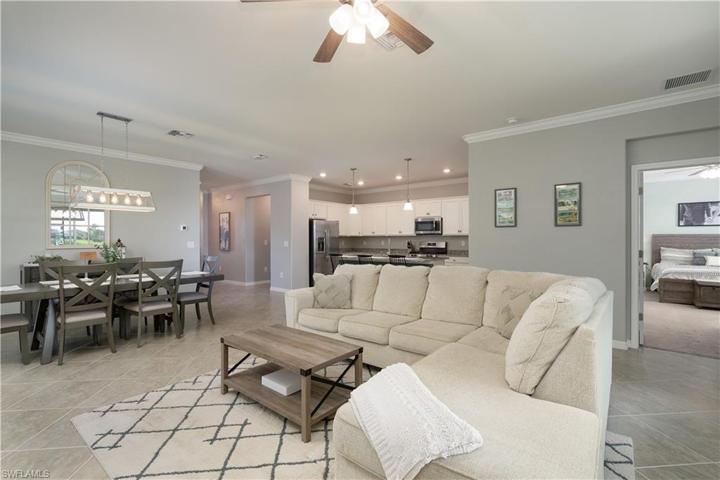 Family room opens to the dining and kitchen area