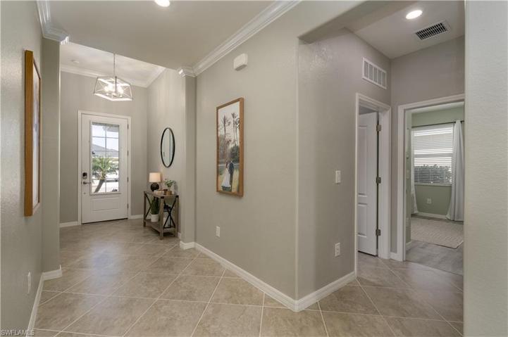 Crown Molding throughout the main living areas, primary bedroom and bathroom too.