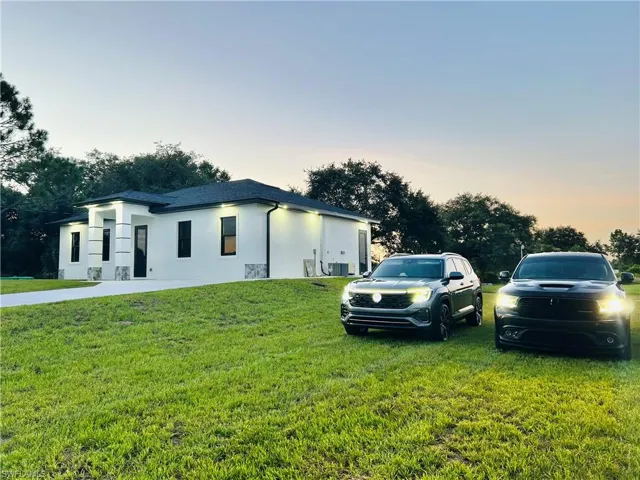 lots of extra parking to the right of the property