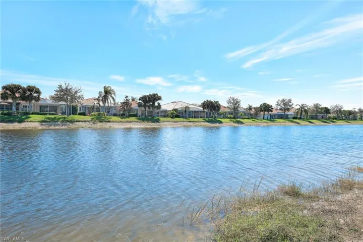 Property view of water with a residential view