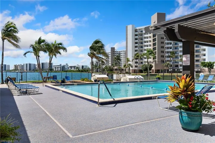 Community pool with a patio area