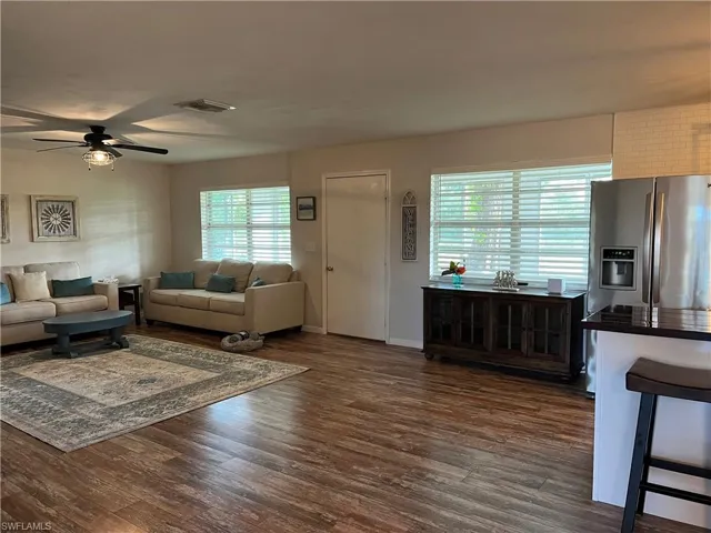 Open living room to kitchen and dining area.