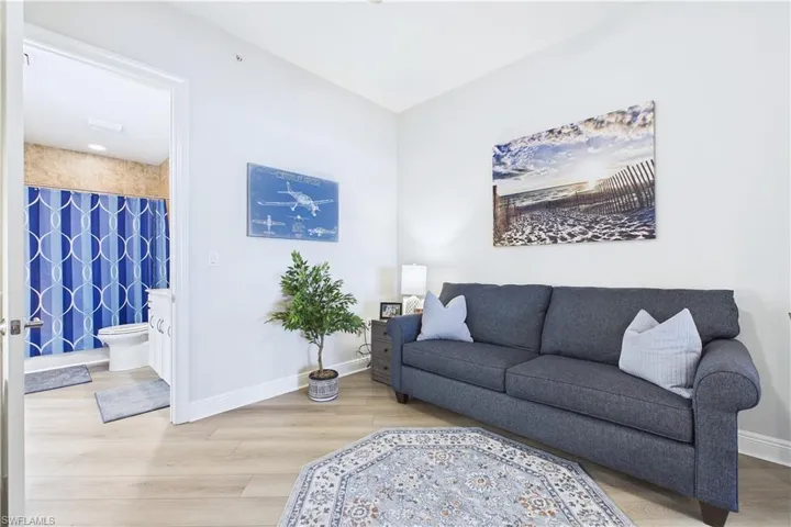 Living room featuring light wood-style flooring