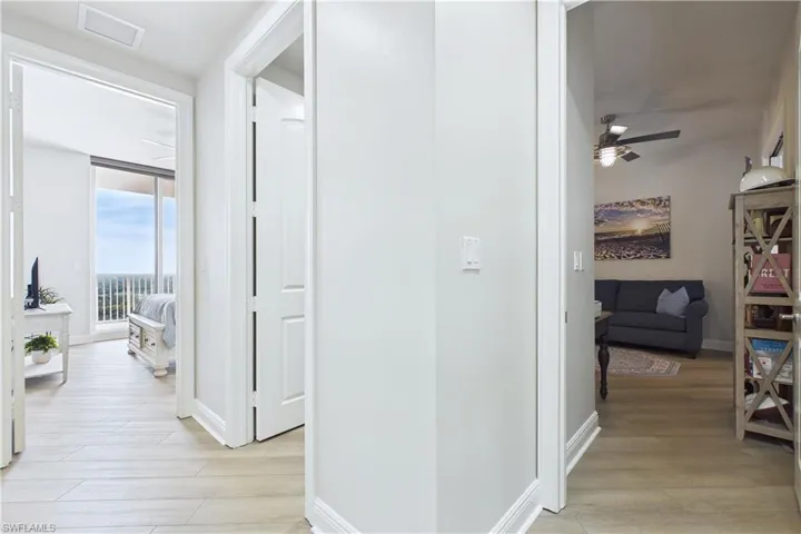 Corridor with light wood finished floors