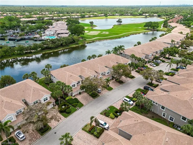 Bird's eye view featuring view of golf course, a residential view, and a water view