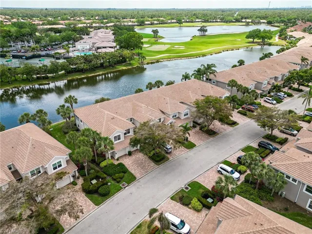 Bird's eye view featuring view of golf course, a residential view, and a water view