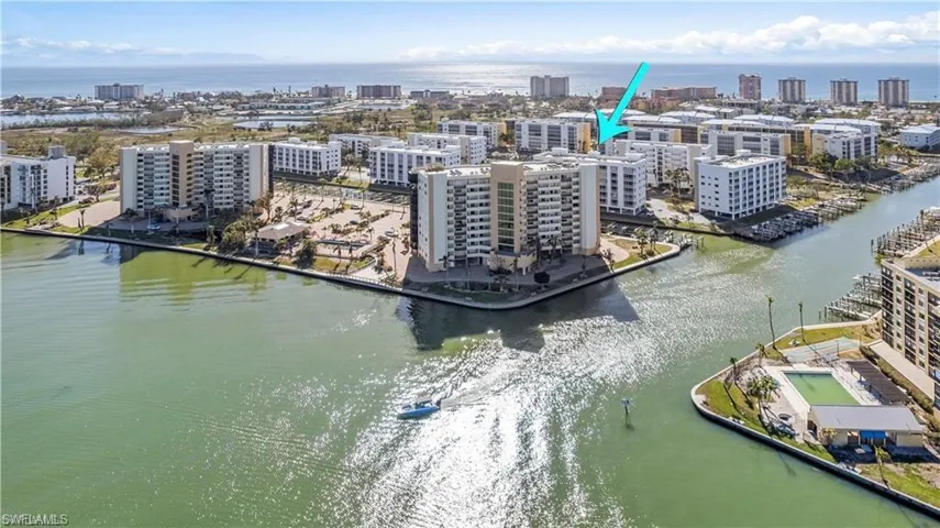 Drone / aerial view featuring a view of city and a water view
