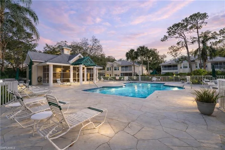 Community pool featuring a patio area