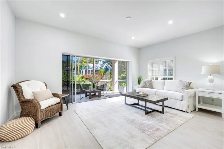Living room featuring recessed lighting and light wood-style flooring