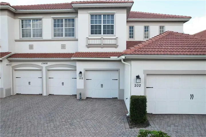 View of front of property with a garage