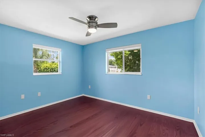 Wood-finish flooring with crisp white trim