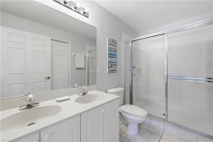 Double sink updated bathroom and shower