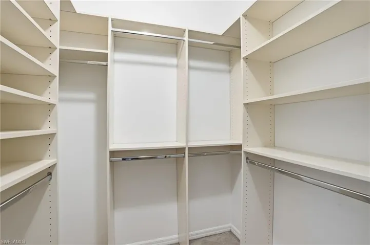 View of walk in closet in Primary Suite
