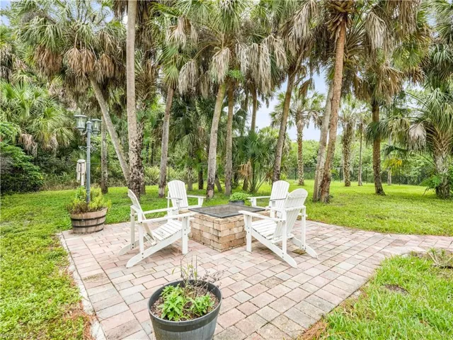 Fenced Back Yard with Fire Pit and Pavers