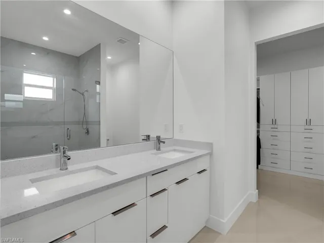 Primary Bathroom with dual sink, soft close cabinets