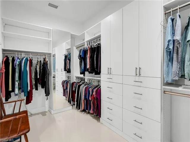 Primary Closet with custom built-in cabinets