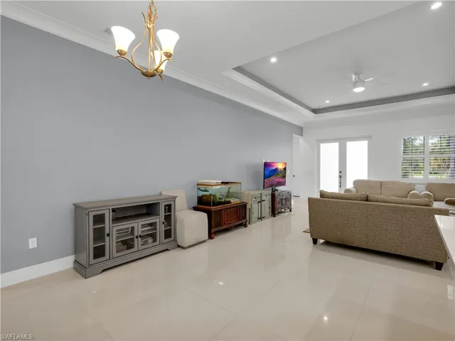Dining Area with large tile flooring and lighting fixture