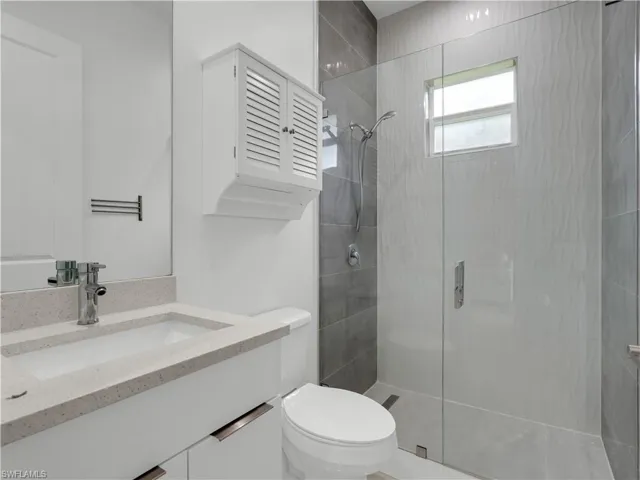 Guest Bathroom #1 with walk-in glass shower