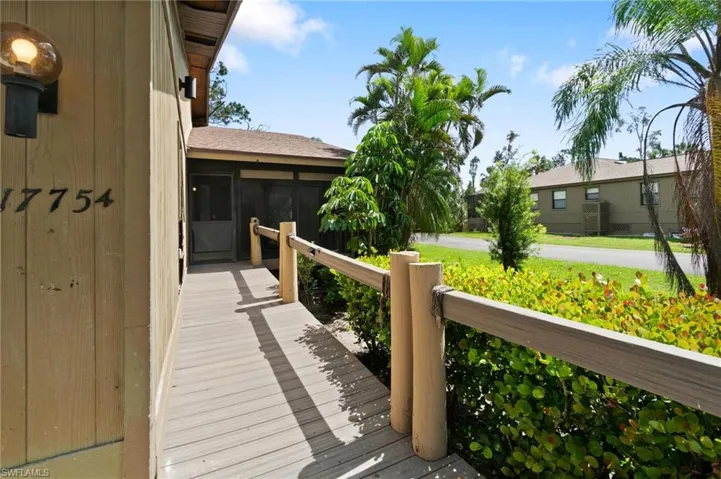 Deck featuring a sunroom