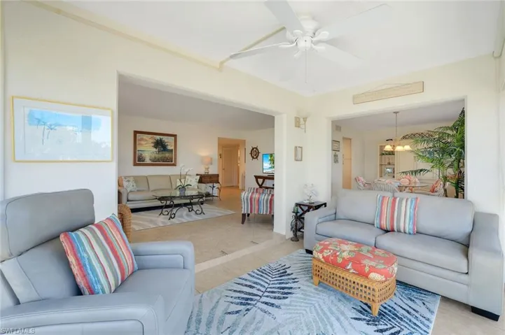 Opens to living and dining rooms