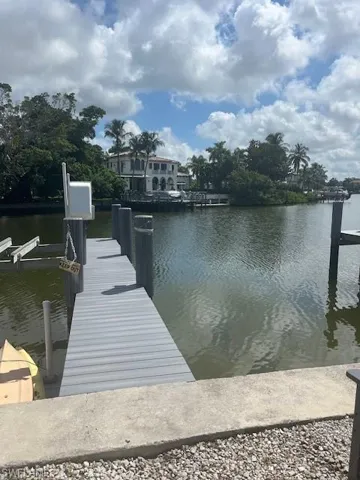 View of dock with a water view