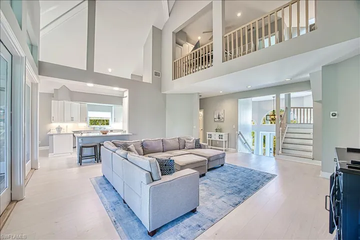 Living room with light wood-type flooring