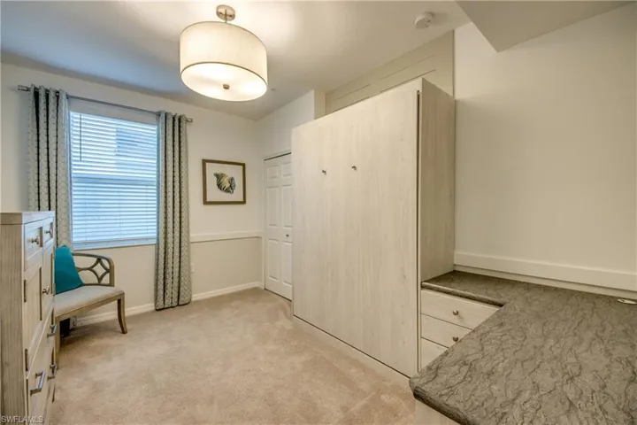 Sitting room with light carpet