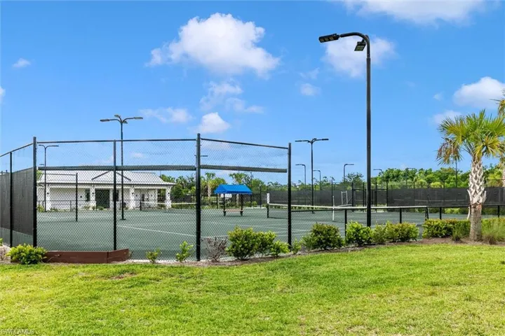 View of lighted tennis courts