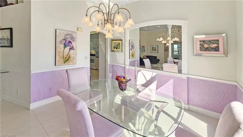 Dining space featuring a notable chandelier