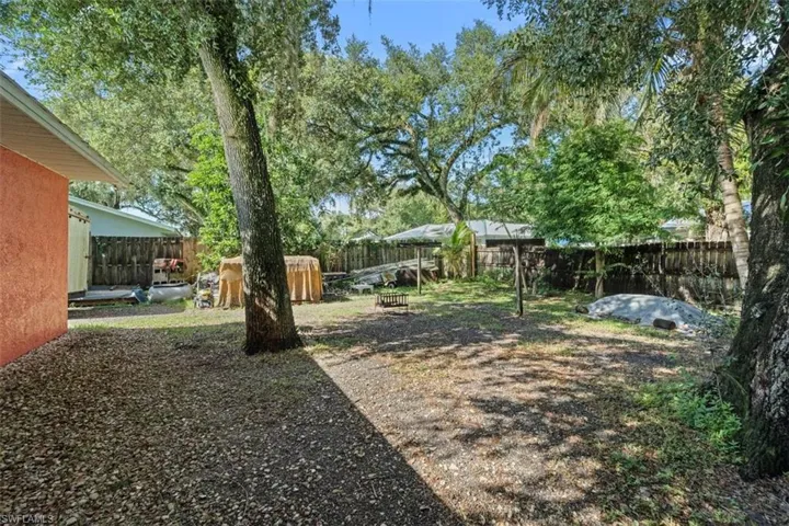 View of fenced backyard