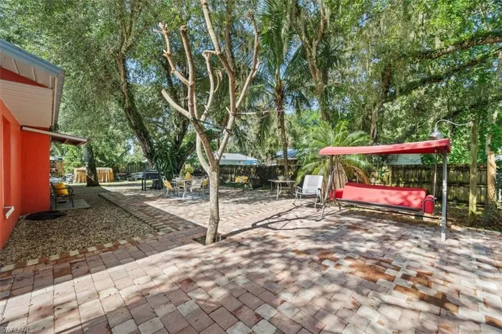 Fenced backyard featuring a patio area