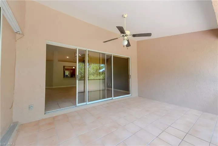 View of patio / terrace featuring a ceiling fan