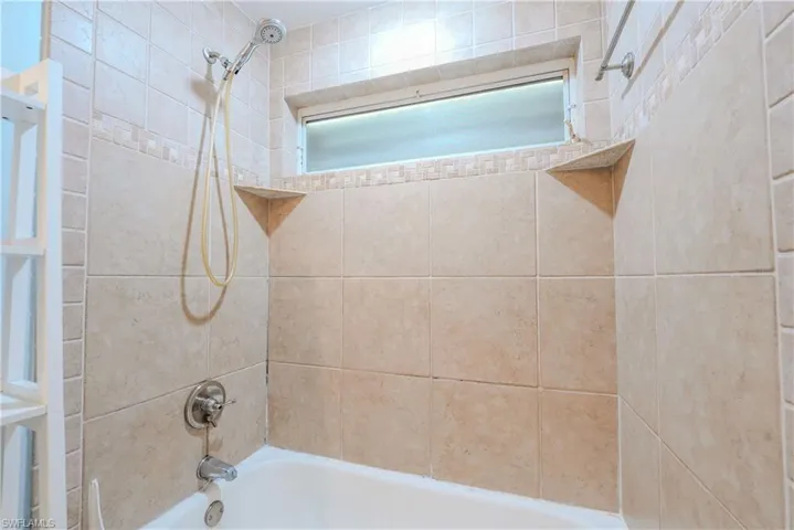 Bathroom featuring  shower combination