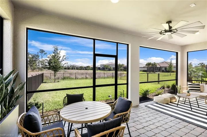 Fenced backyard with tranquil preserve views.