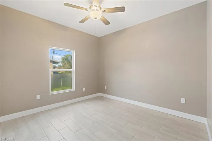 Unfurnished room with ceiling fan