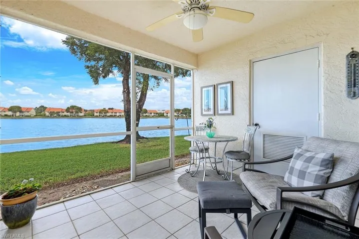 Your screened Lanai is complete with a WOW water view, comfortable seating area and storage closet