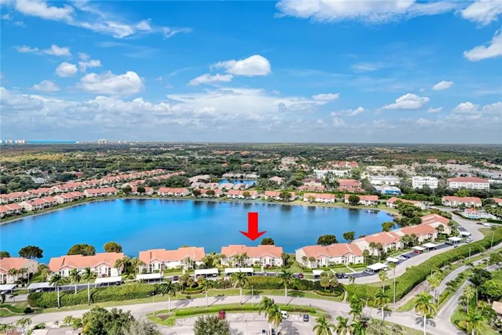 Aerial view of residential area with a large body of water