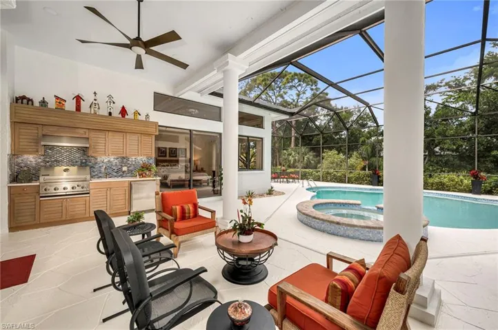 Large covered lanai and grill area.  Lounge outside but not be in the sun...if you wish...perfect place for reading a book and relaxing!