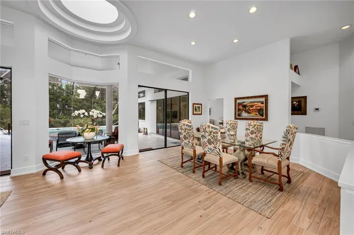 Dining area is perfect for hosting a large dinner party. Open with clear views to pool/spa and private backdrop